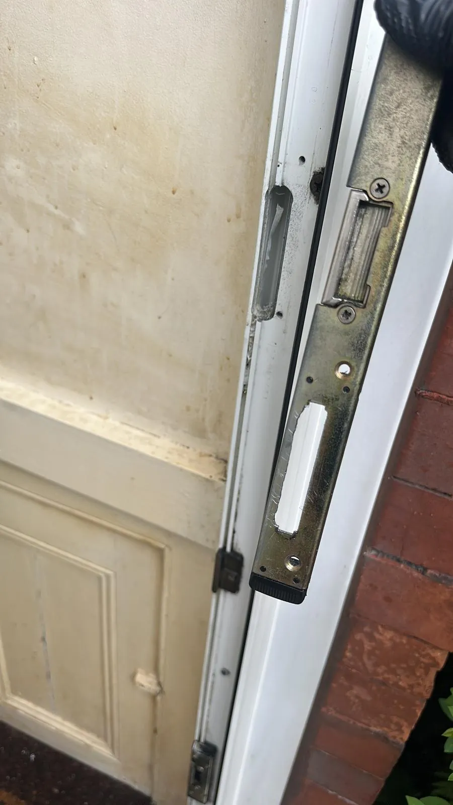 A multipoint locking plate visible in the edge of a door.